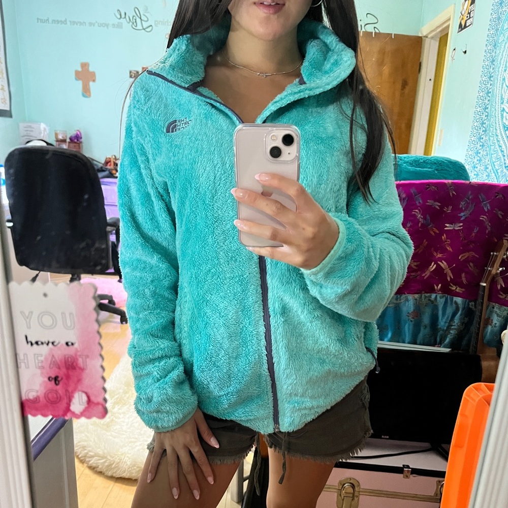 An Aqua North Face Jacket